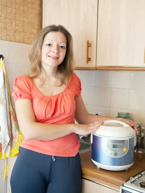 woman with slow cooker clipart