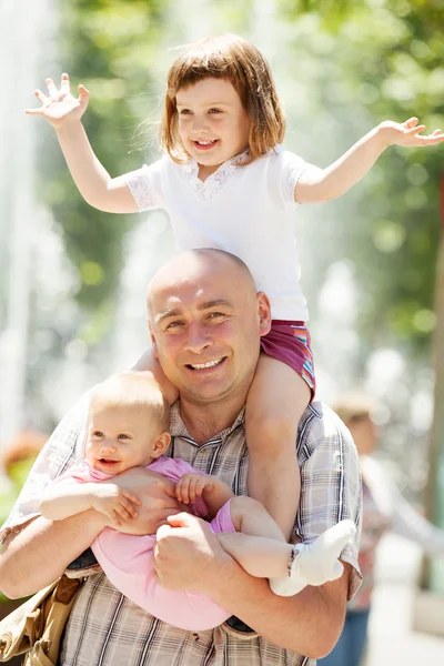 Happy father with two adorable daughters — Stock Photo, Image