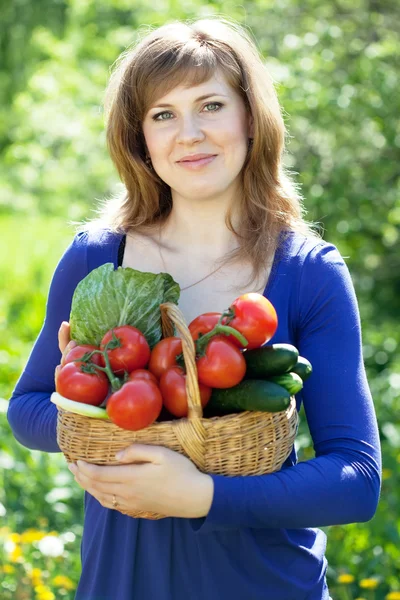 Girl with vegetables harvest — Stock Photo, Image