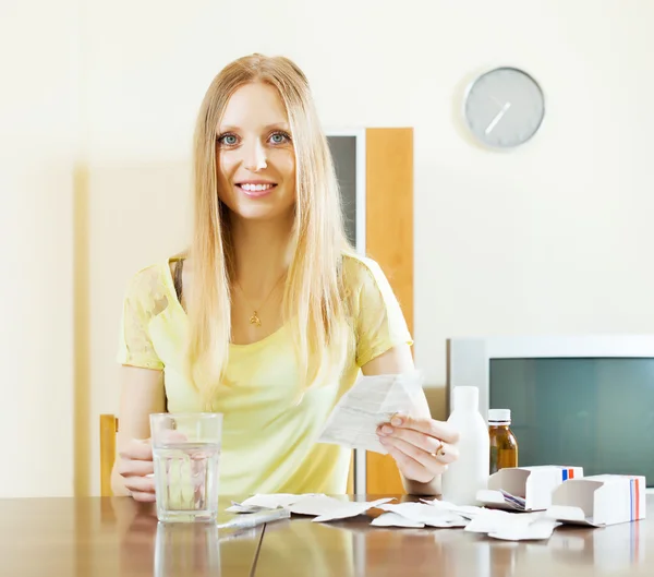 Woman with medications at home — Stock Photo, Image
