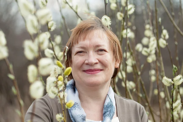 Mature woman in spring — Stock Photo, Image