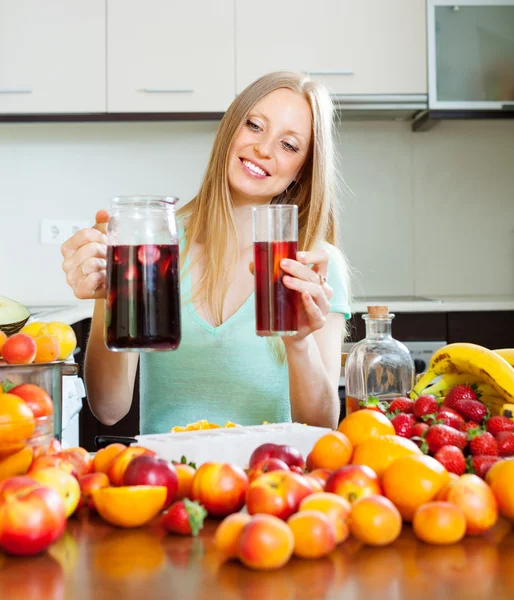 Cheerful woman tasting beverages — Stock Photo, Image