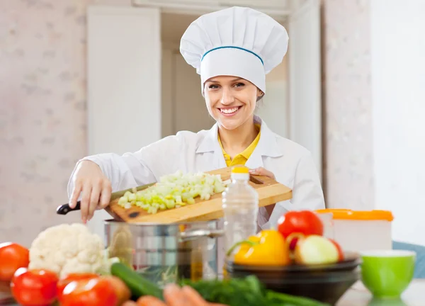 Cook woman cooking vegetarian dinner — Stock Photo, Image