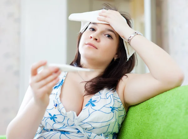 Sick woman having temperature — Stock Photo, Image