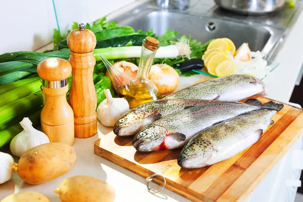 Trout fish in home kitchen — Stock Photo, Image