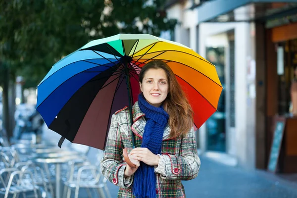 Beauty girl with umbrella in autumn street — Stock Photo, Image