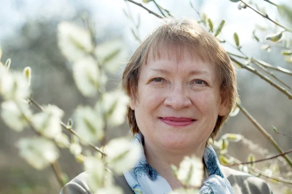 Mature woman in spring — Stock Photo, Image