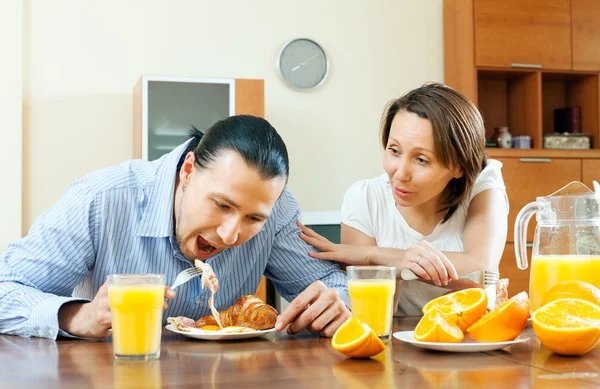 Happy couple having breakfast after night together — Stock Photo, Image