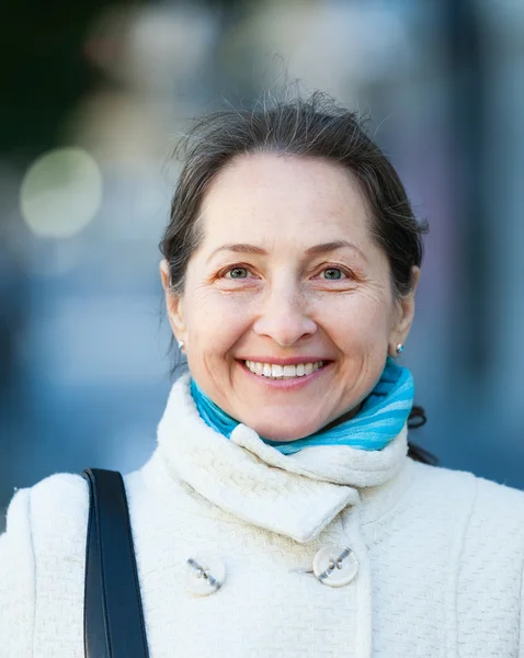 Mature woman in autumn — Stock Photo, Image