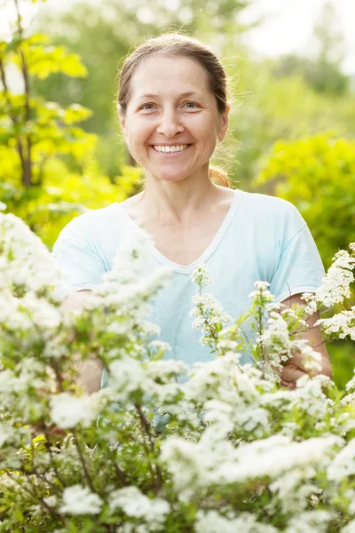 Happy mature woman at garden — Stock Photo, Image