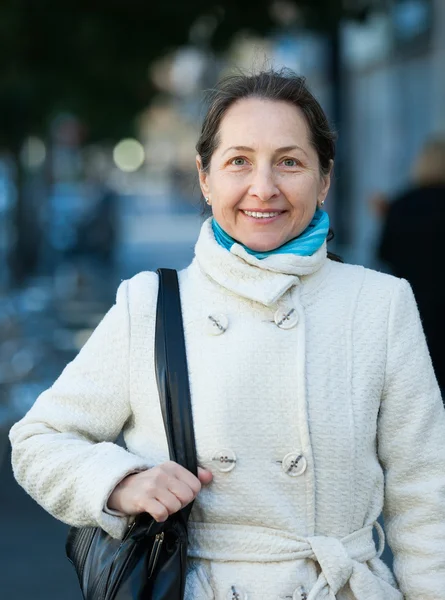 Mature woman in autumn — Stock Photo, Image