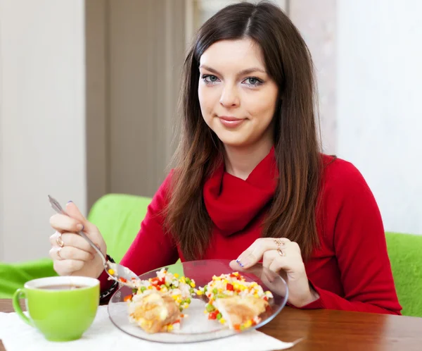 Woman divided lunch for two parts — Stock Photo, Image