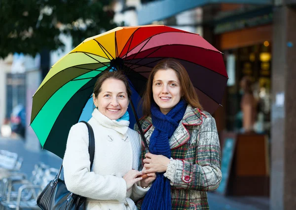 Mature woman with adult daughter in autumn — Stock Photo, Image