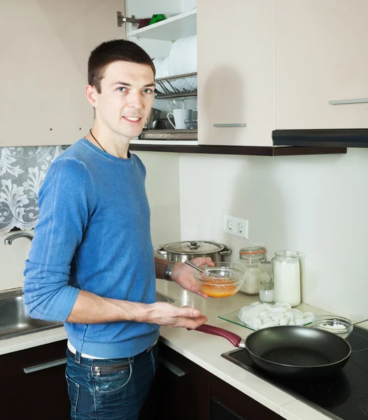 Man preparing batter for cooking — Stock Photo, Image