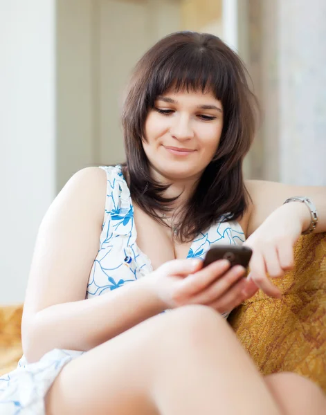 Quiet woman uses mobile — Stock Photo, Image