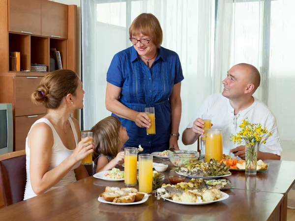 Multigeneration family communicate over health — Stock Photo, Image