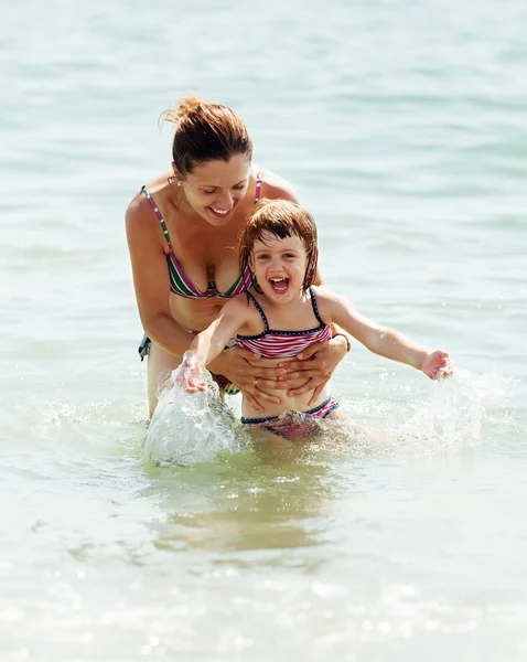 Mother with child in sea — Stock Photo, Image