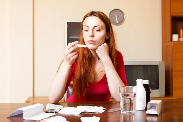 Woman measuring temperature — Stock Photo, Image