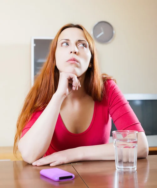 Sad woman with mobile — Stock Photo, Image