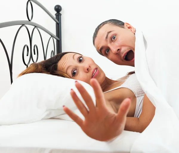 Lovers caught in bed — Stock Photo, Image