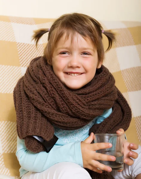 Happy baby girl in warm scarf — Stock Photo, Image