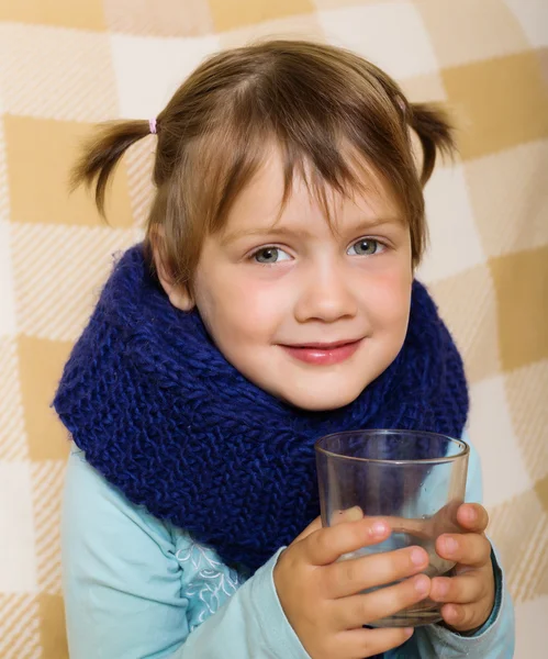 Illness baby girl in warm scarf — Stock Photo, Image