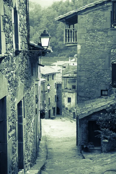 Narrow street of old Catalan village — Stock Photo, Image