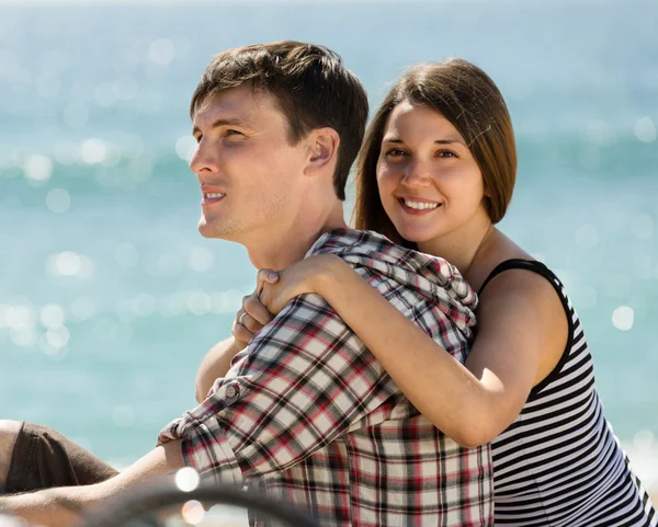 Young woman hugging man — Stock Photo, Image