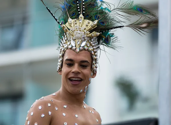 Unidentified guy in plumage at Gay pride parade in Sitges — Stock Photo, Image