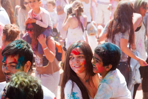 Woman with baby at  Festival  Holi Barcelona — Stock Photo, Image