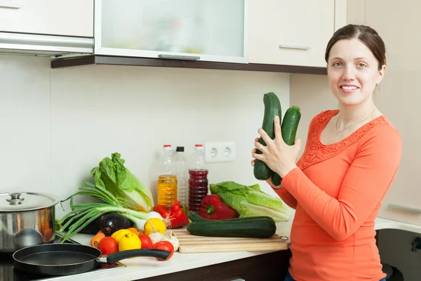 Woman cooking with squash — Stock Photo, Image