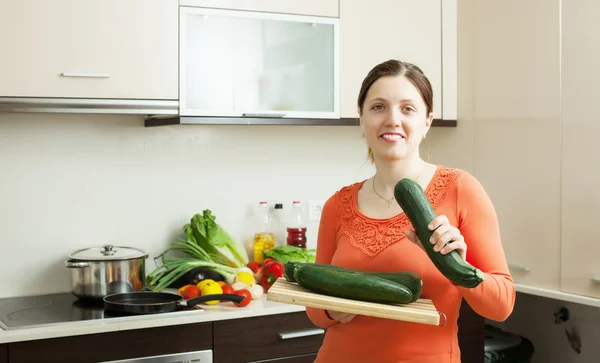 Positive woman in home kitchen — Stock Photo, Image