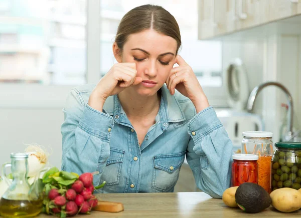 Tired woman sitting at home kitchen — Stock Photo, Image