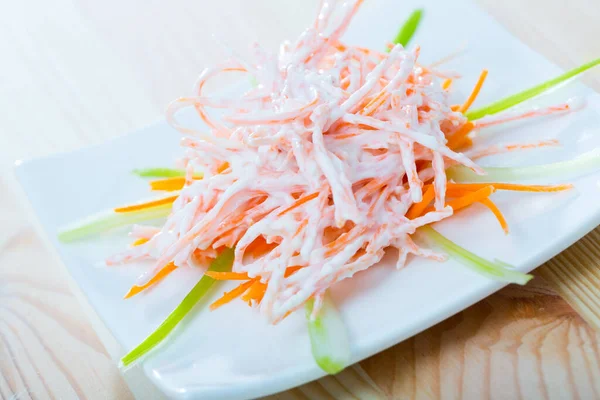 Close up of tasty dish of fresh vsalad with carrots, garlic and greek yogurt Stock Picture