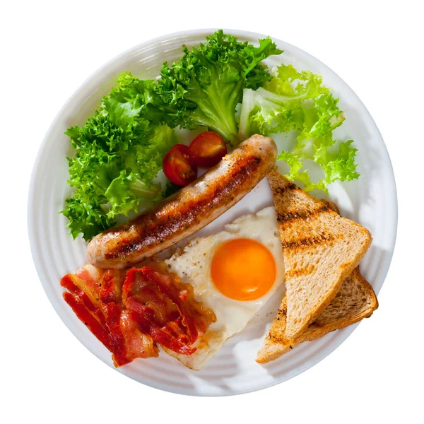 Κάτοψη τηγανιτών αυγών με μπέικον, λουκάνικο και τοστ — Φωτογραφία Αρχείου
