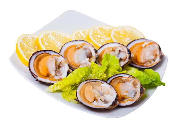 Fresh bivalve mussels with lemon — Stock Photo, Image