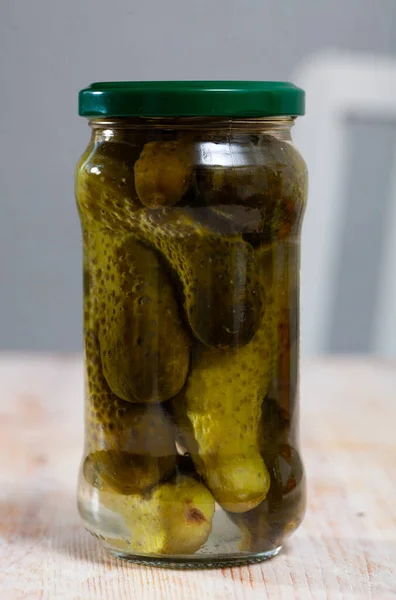 Glass jar of pickled cucumbers — Stock Photo, Image