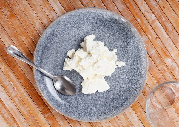 View of appetizing young cheese on plate — Stock Photo, Image