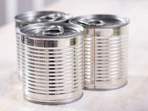 Three silver tin cans closeup — Stock Photo, Image