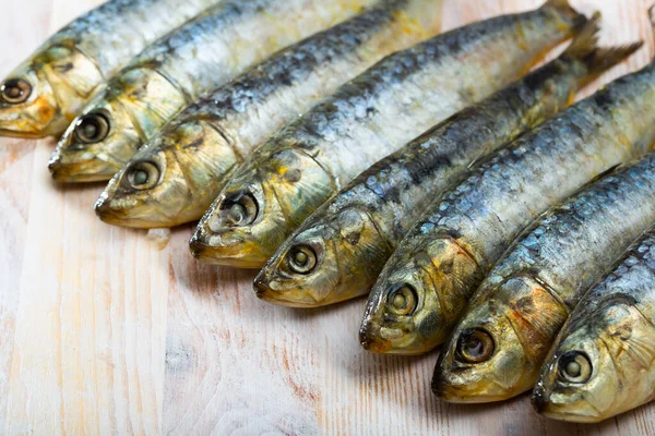 Marinated sardines on wooden table — Stock Photo, Image