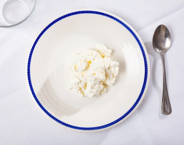 Fresh cottage cheese on plate — Stock Photo, Image
