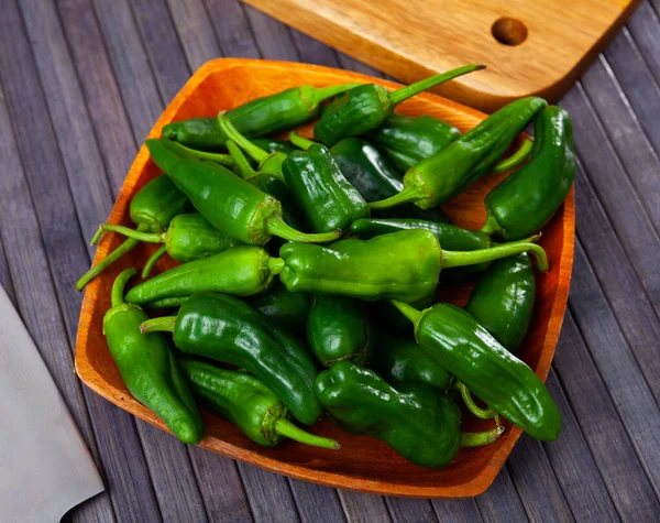 Raw green spanish Padron peppers on table — Stock Photo, Image