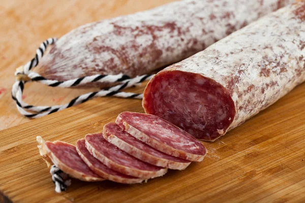 Catalan sausage Longaniza with sliced pieces — Stock Photo, Image