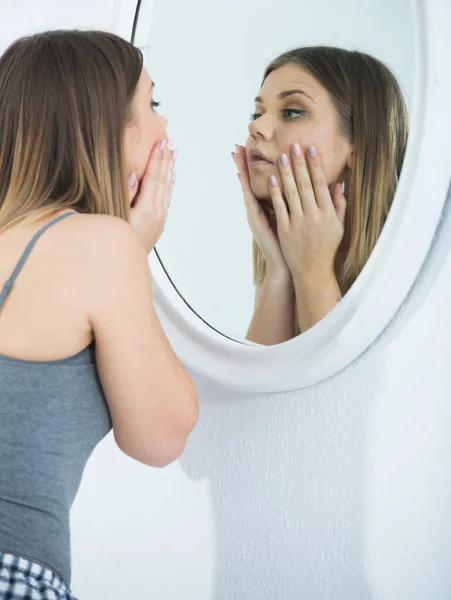 Young Female Touching Face Using Mirror Bedroom Morning — Stock Photo, Image