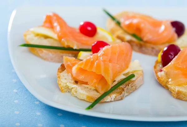Bruschettes with salmon — Stock Photo, Image