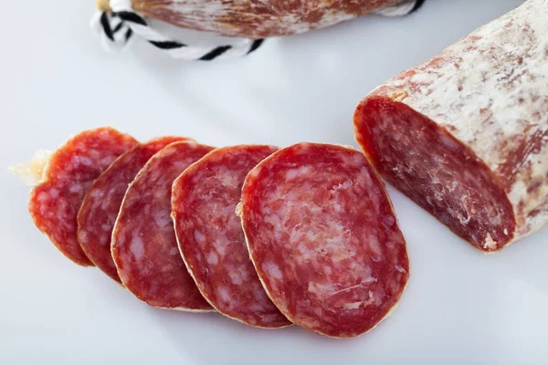 Fresh Spanish Longaniza Sausages Cut Slices White Surface Close Stock Picture