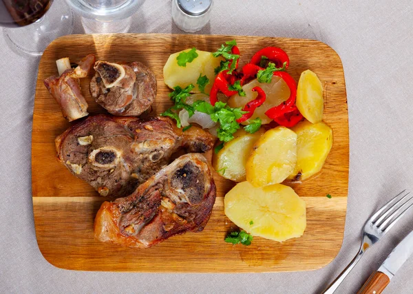 Delicious Baked Lamb Leg Slices Served Fried Potatoes Red Pepper — Stock Photo, Image