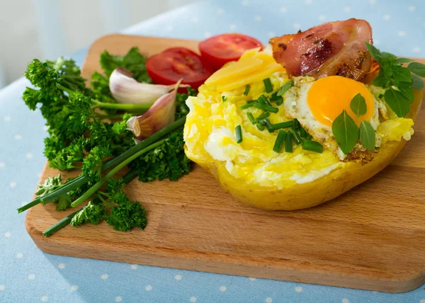 Roasted Potato Stuffed Egg Bacon Chives Served Wooden Cutting Board — Stock Fotó
