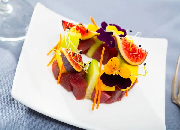 Raw Tuna Tartare Served White Plate Figs Cucumber Garnished Heartsease — Stock Photo, Image