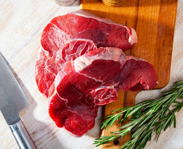 Fresh Raw Beef Steak Wooden Background Herbs — Stock Photo, Image